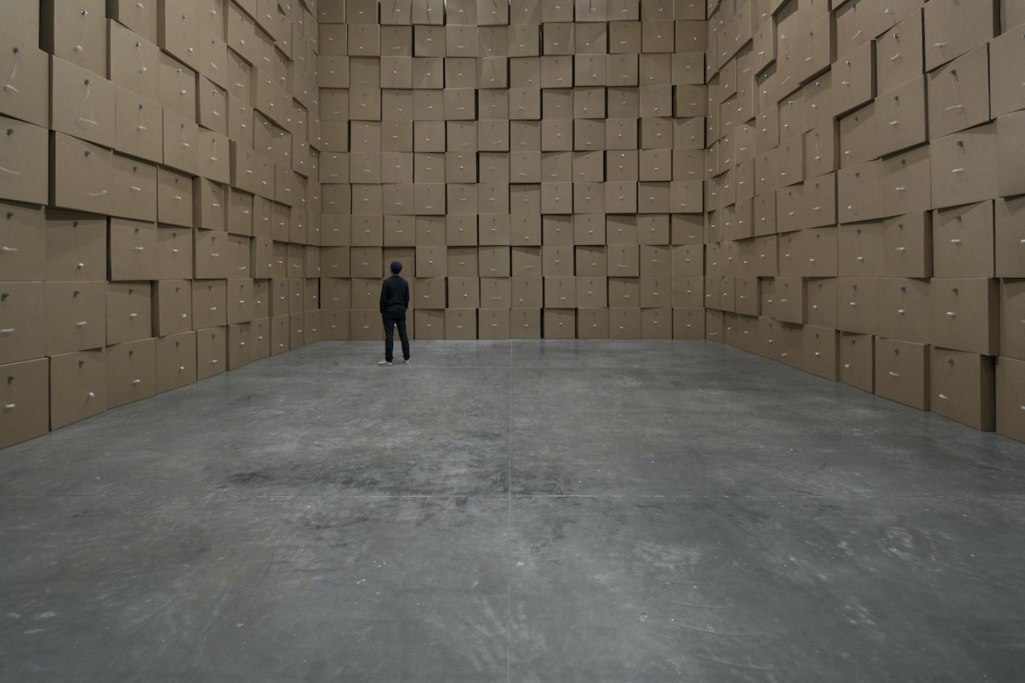 168 prepared dc-motors, cotton balls, cardboard boxes by Zimoun